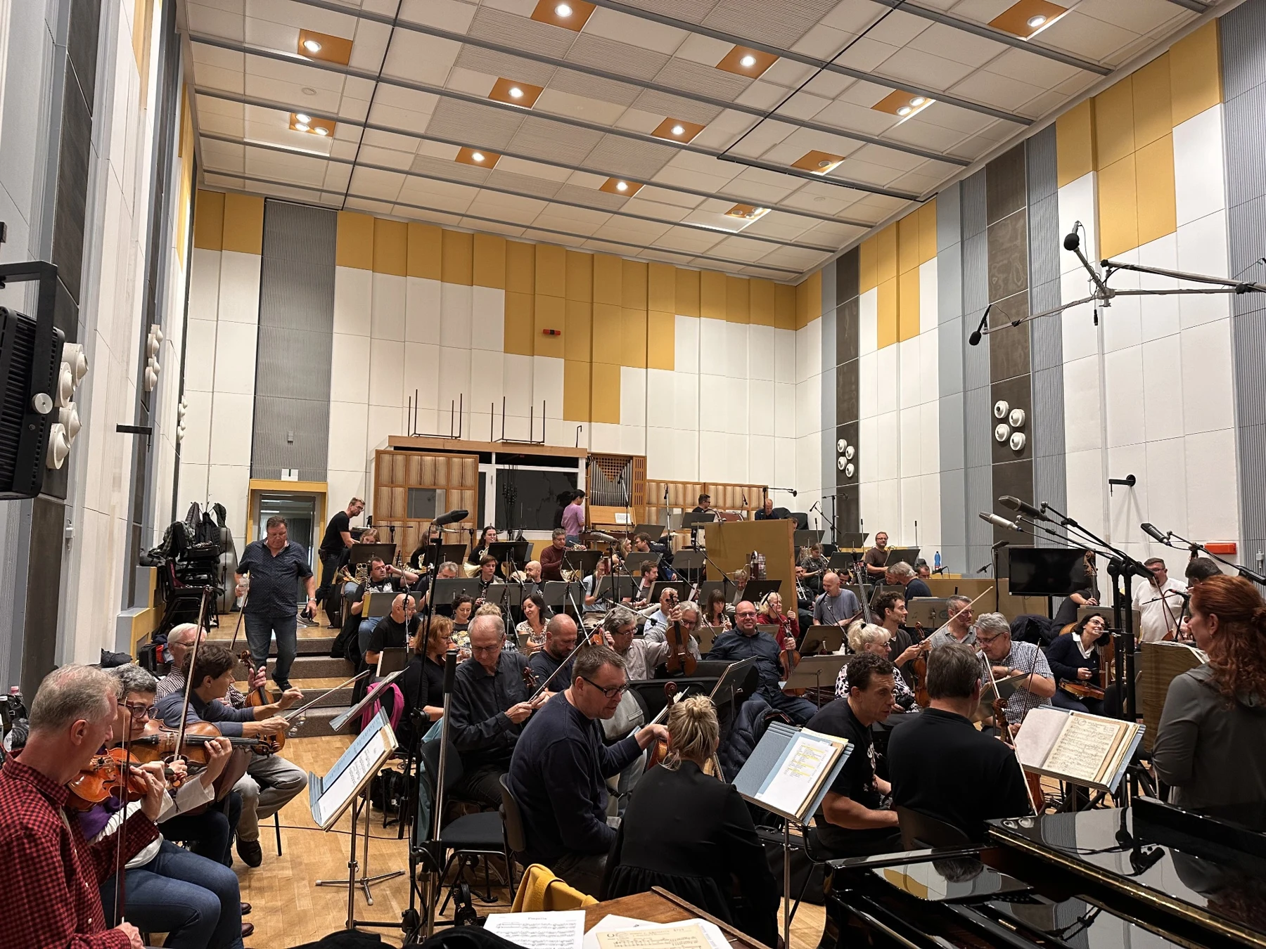 Orchestra preparing for a recording session